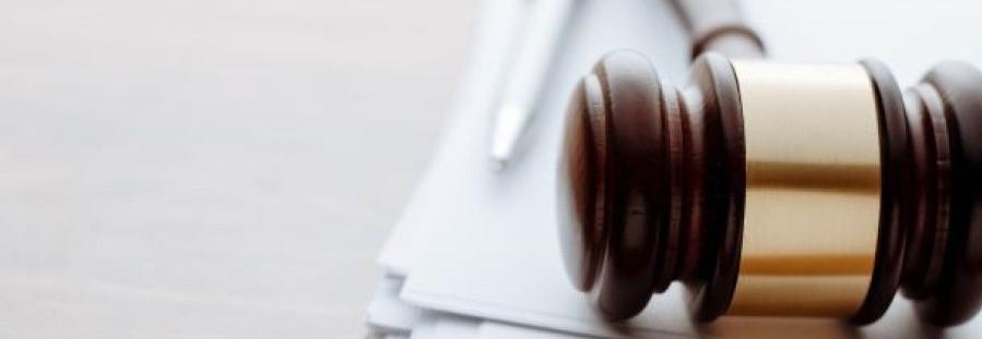 Transfer of leased building by developer classified as transfer of going concern for VAT purposes despite earlier decision